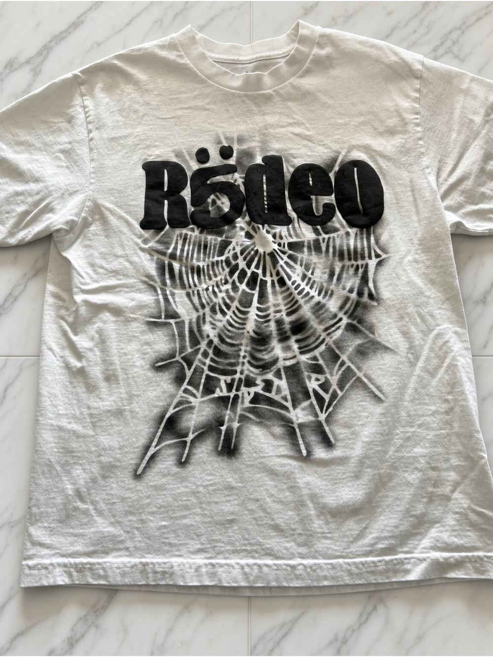 White Graphic Tee with Black Rodeo Logo and Spiderweb Print Small